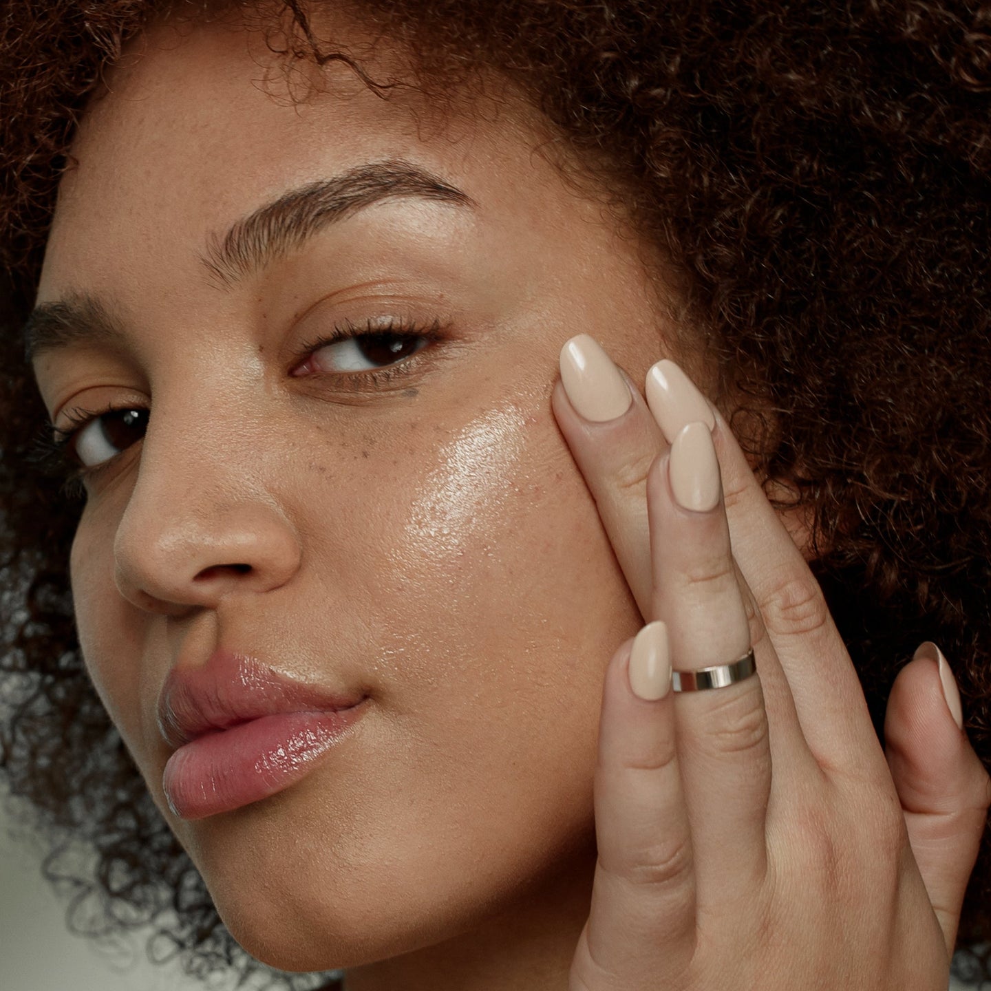 MATTER OF FACT SKINCARE RESURFACING AND HYDRATING SERUM being applied on the face